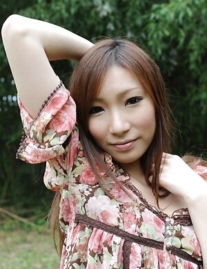 Kaoru Sakaki gets naked outside and reveals her hairy pussy