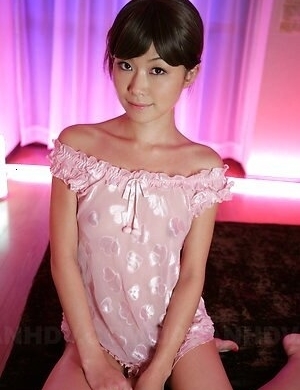 Nanako Takeuchi is so sensual in pink lingerie and she shows her tits.