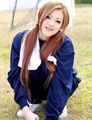 An Umemiya poses out on the field